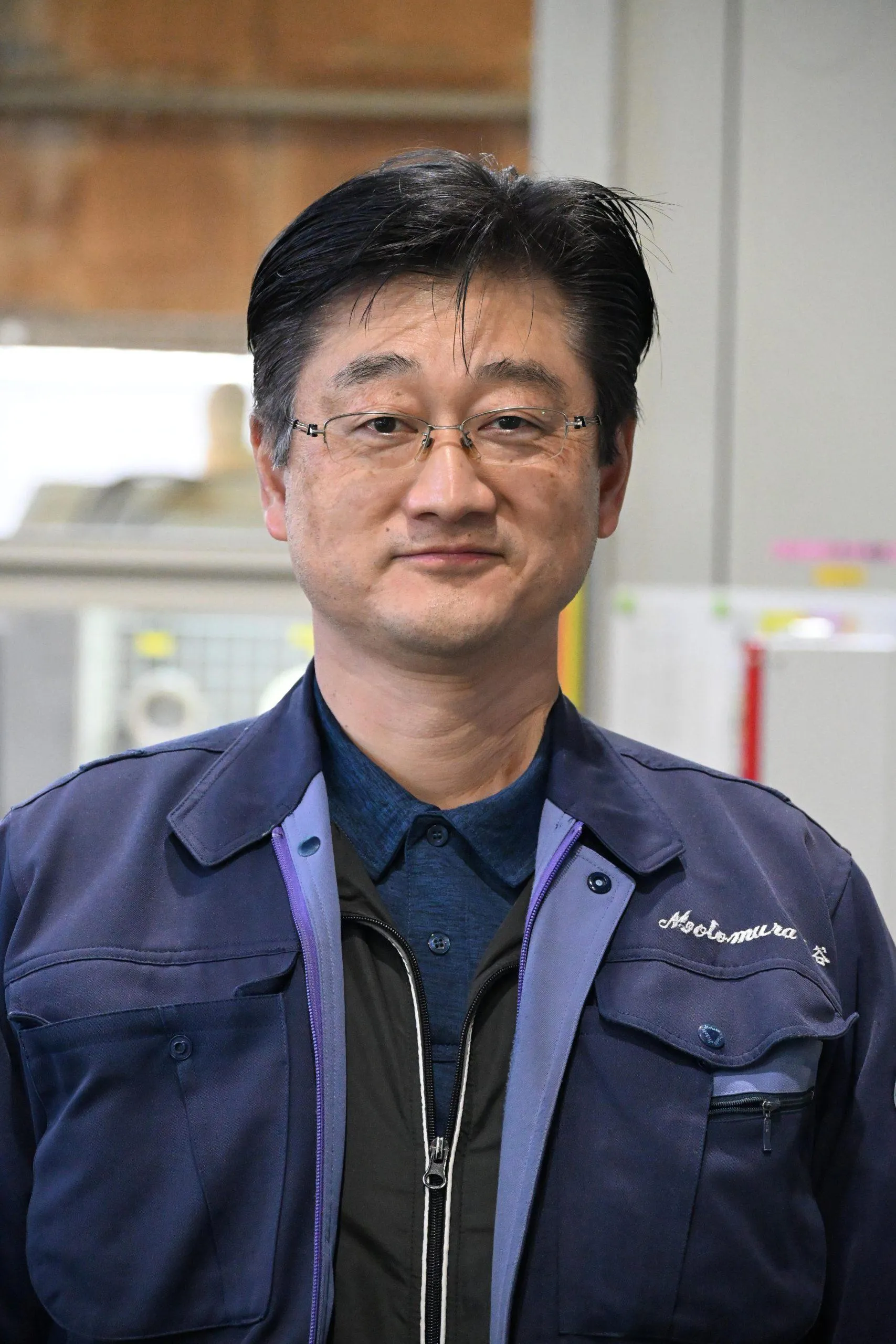 倉庫責任者 梶谷幸利の顔写真